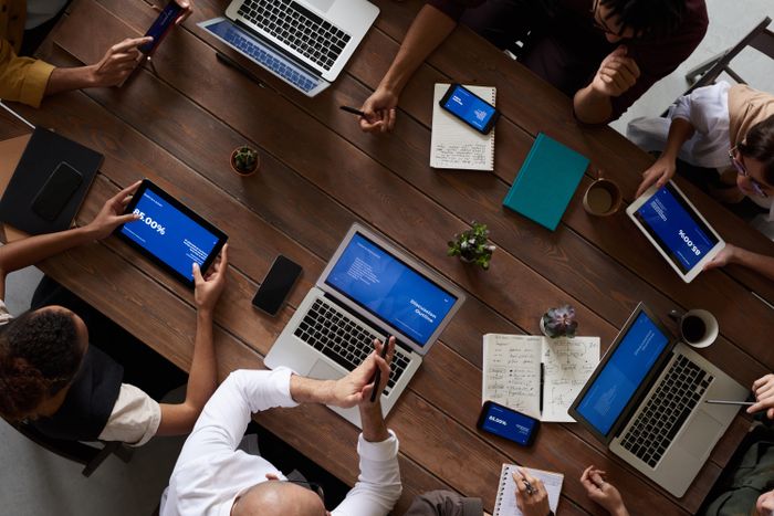 A small team meeting around a table